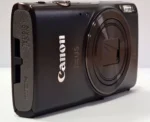 Canon IXUS 285 HS 20,2 Megapixel Full HD Kompaktkamera, 12-fach optischer/4-fach digitaler Zoom, 25 - 300 mm Brennweite, optischer Bildstabilisator, 1/2,3'' CMOS-Sensor, F3,6 (W) - F7 (T), 7,62 cm (3 Zoll) Display, WLAN, HDMI, Gesichts- und Lächelerkennung